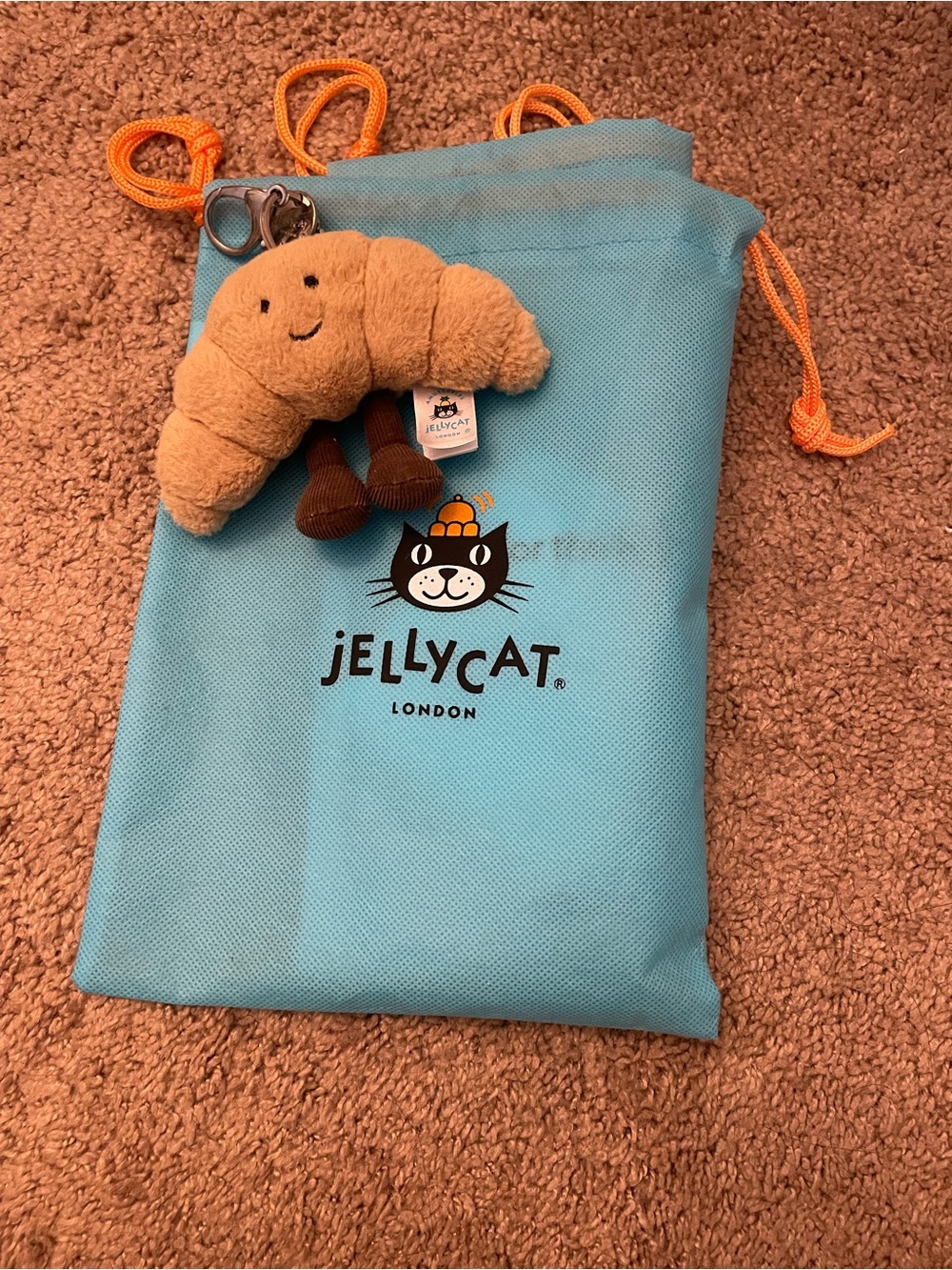 Jellycat Blue Drawstring Pouch with Tan Croissant Charm